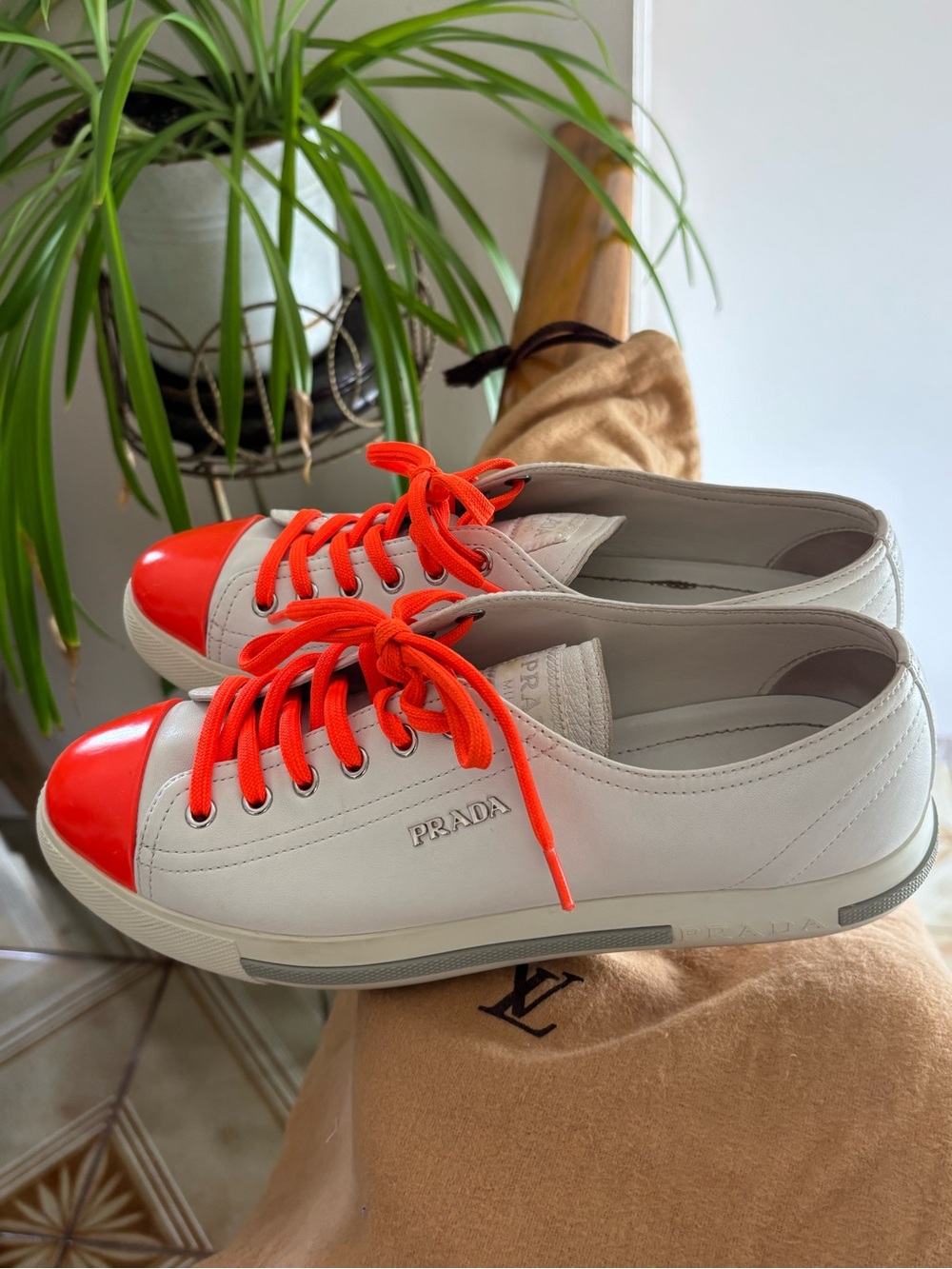 Prada White Leather Low-Top Sneakers with Bright Orange Laces
